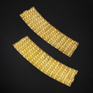 A pair of Cuff Bracelets